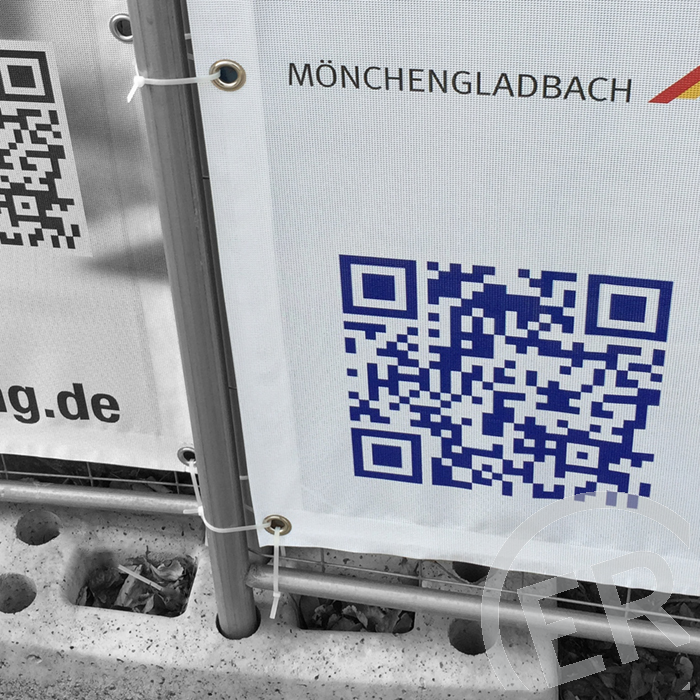 Bauzaunbanner aus Mönchengladbach – bedruckte Mesh-Banner an einem Bauzaun