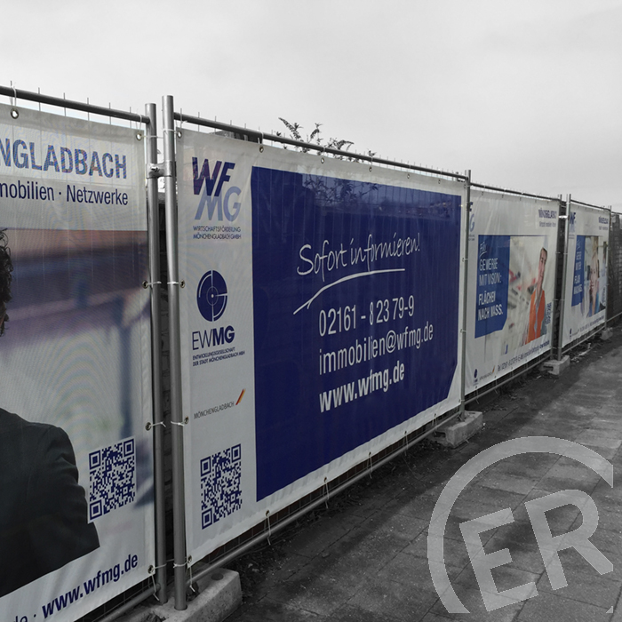 Bauzaunbanner aus Mönchengladbach – bedruckte Mesh-Banner an einem Bauzaun