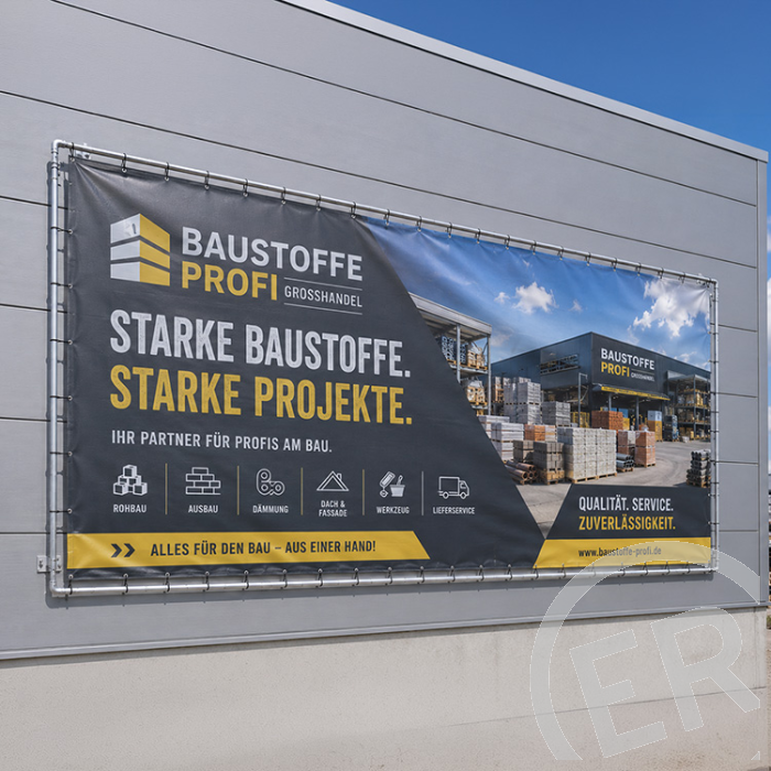 Großformatdruck Mönchengladbach – großes Werbebanner im Bannerrahmensystem an einer Hallenfassade